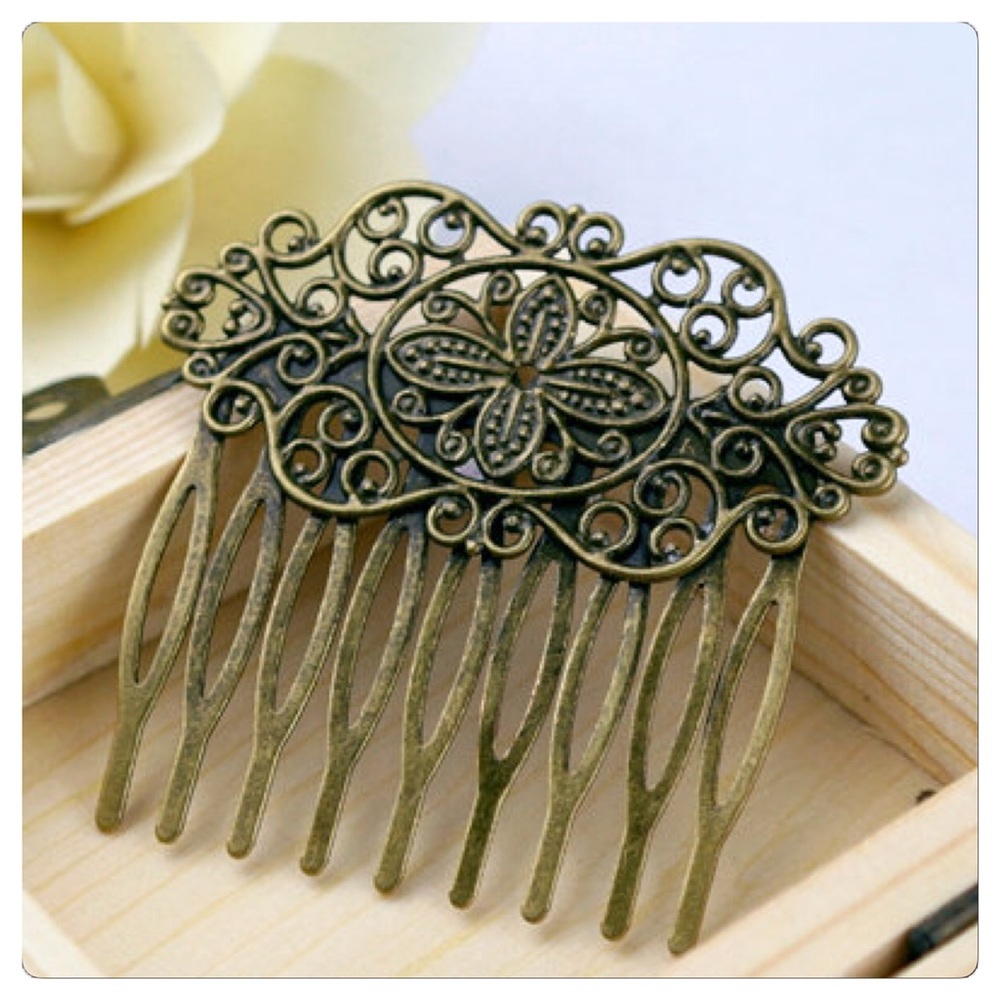 Two Antique Bronze Hair Combs